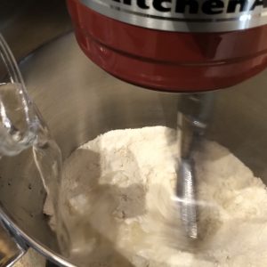 Add lukewarm water and mix for two minutes on low.