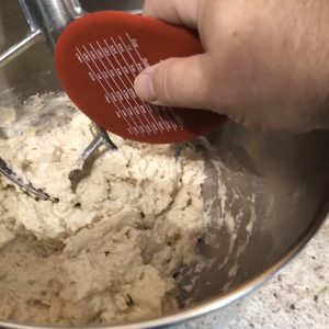 Remove excess dough from the mixer