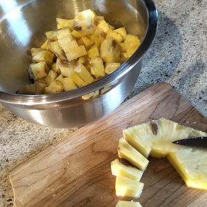 Cut the pineapple into cubes