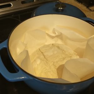 Drop the bread into the casserole dish. WARNING!!! Be careful to put on your oven mitts … everything is extremely hot!