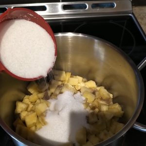 A quarter cup of sugar per cup of pineapple